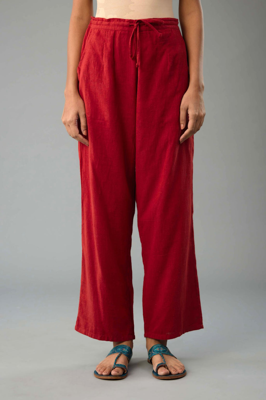 Red handloom cotton straight pants.