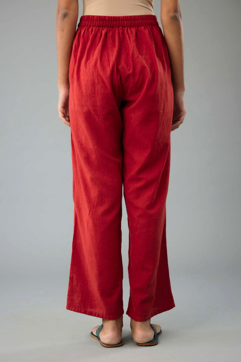 Red handloom cotton straight pants.