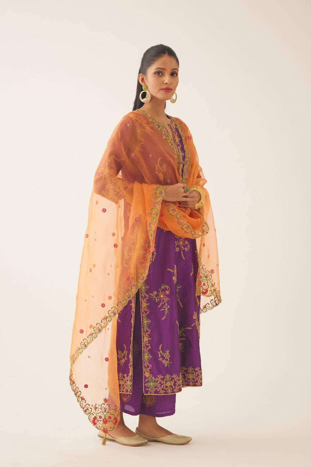 Plum purple straight silk kurta set with all over dori & silk thread embroidery highlighted with contrast bead & sequins work.