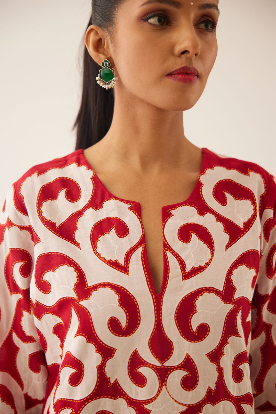 Red silk chanderi straight kurta set with all-over cotton appliqué trellis jaal, highlighted with kantha work.