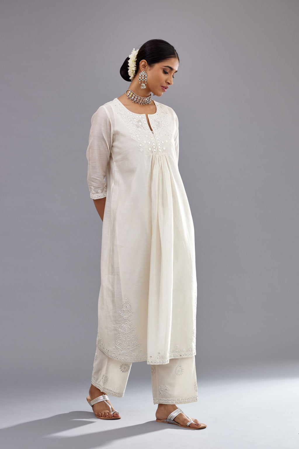 Off white silk Chanderi straight long kurta dress set with off-white thread and mirror embroidery.