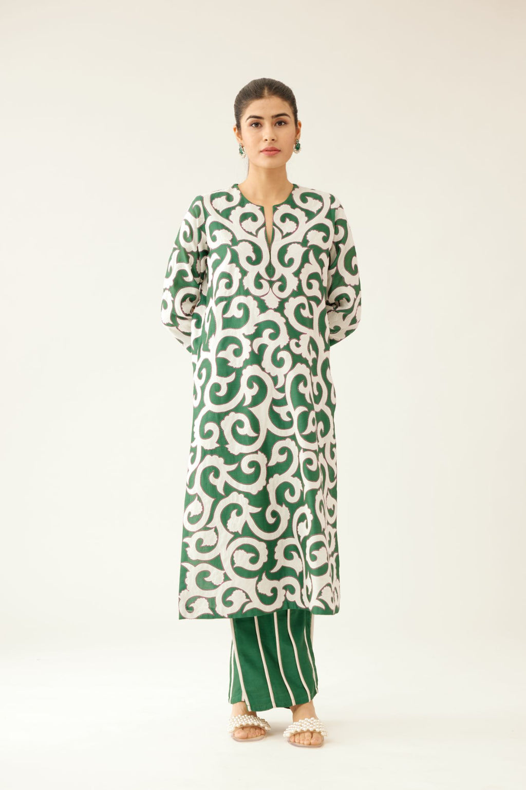 Green silk chanderi straight kurta set with all-over cotton appliqué trellis jaal, highlighted with kantha work.
