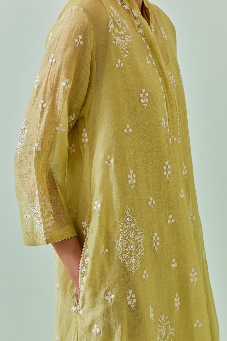 Green short shirt-kurta set with all-over off white Dori embroidery and highlighted with delicate beaded work.