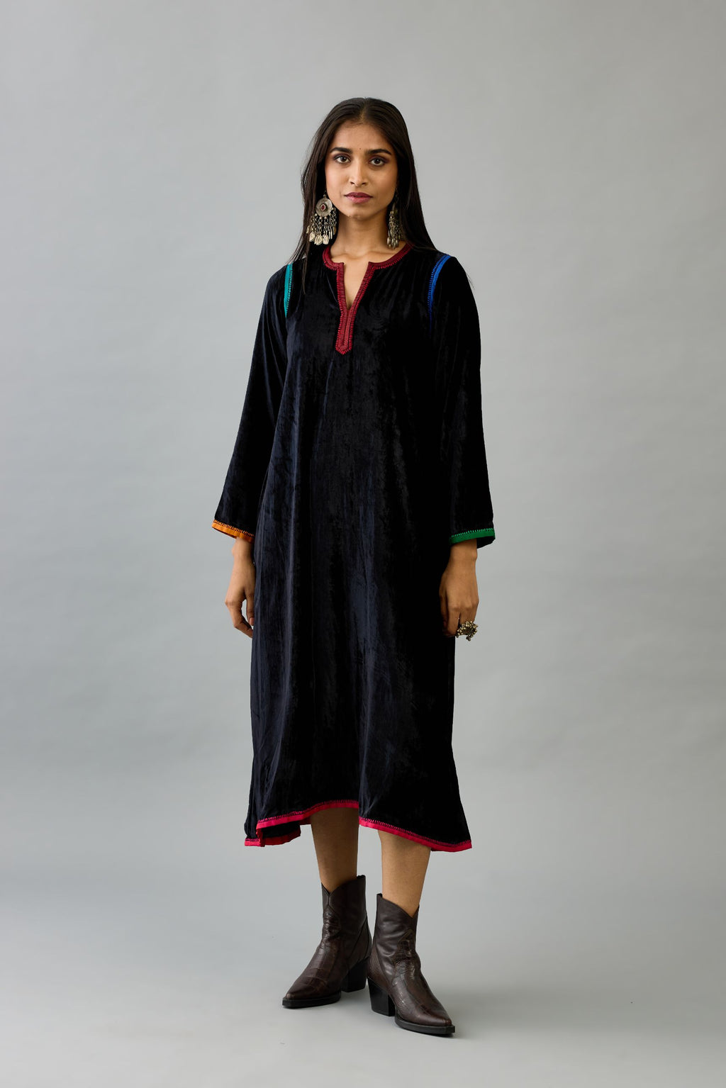 Black silk velvet long A-line kurta with multi colored silk facing and embroidery, paired with black silk velvet straight pants