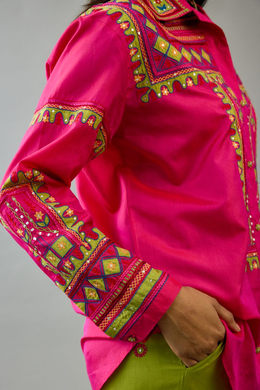 Fuchsia silk embroidered shirt set with full sleeves.