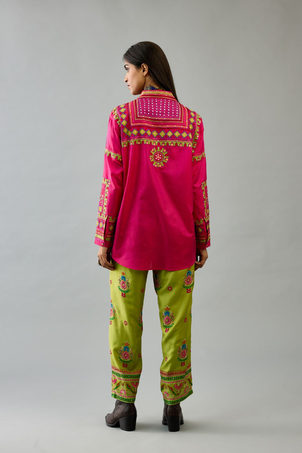 Fuchsia silk embroidered shirt set with full sleeves.