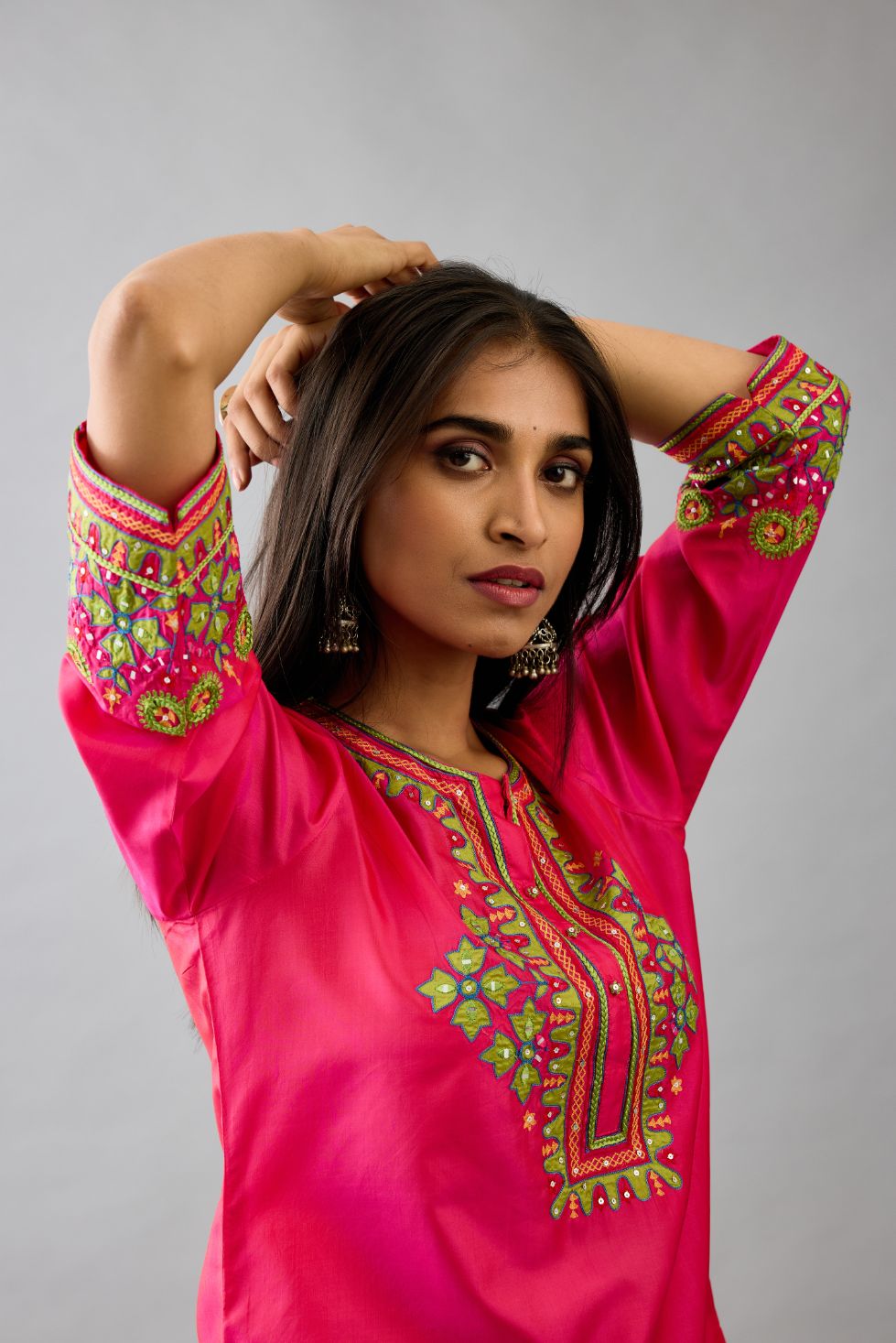 Fuchsia silk embroidered short top set with 3/4th sleeves.