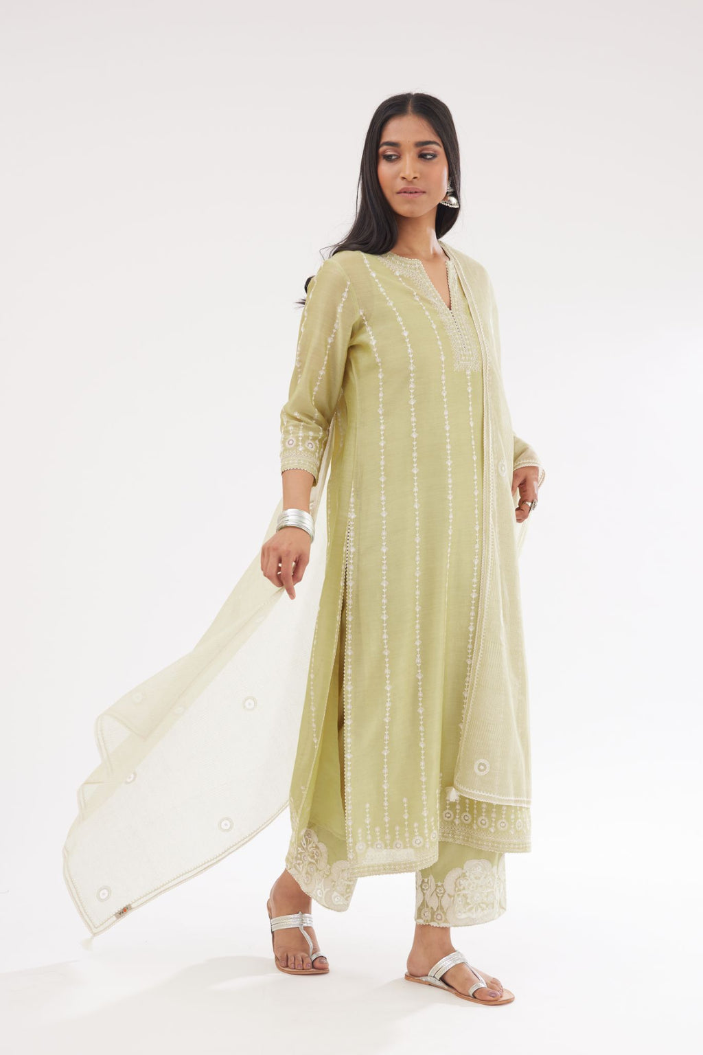 Green silk chanderi straight kurta set with all over dori and silk thread embroidery.