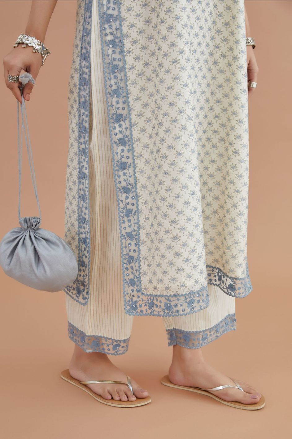 Silk Chanderi kurta set with all-over blue lotus hand block print and embroidery at neck, kurta sides and sleeves