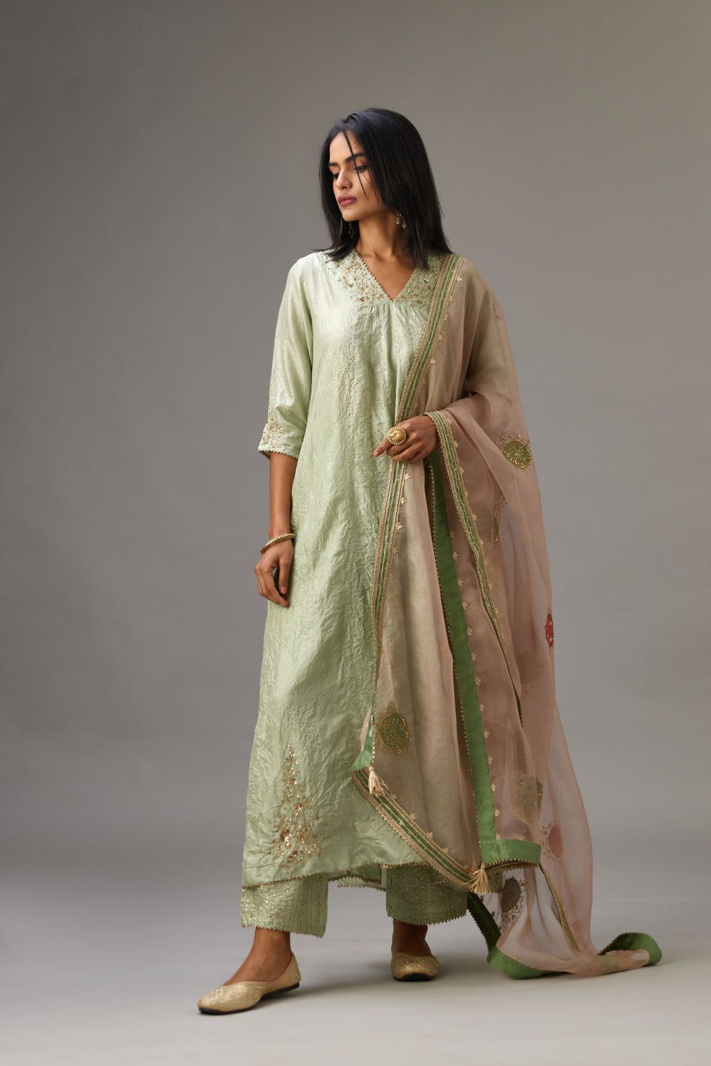 Green hand crushed silk kurta dress with a V neck embroidered yoke and panels.