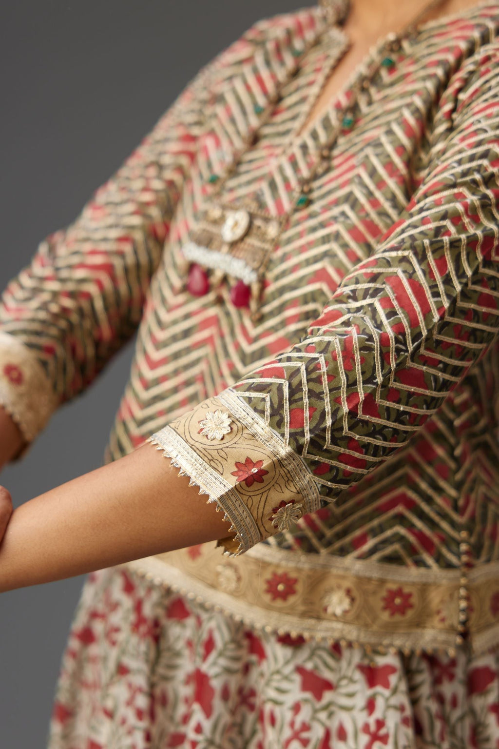 Silk chanderi hand block printed choli with all-over gota detailing.