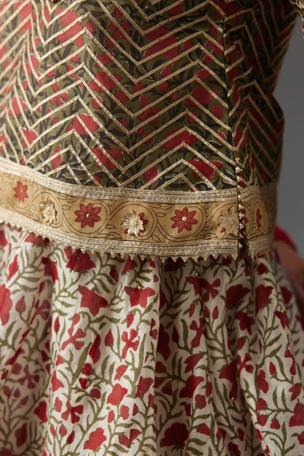 Silk chanderi hand block printed choli with all-over gota detailing.