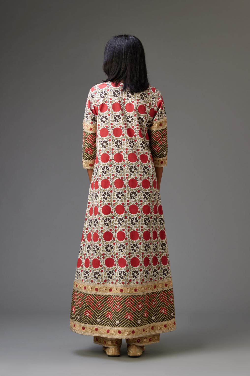 Hand block printed A-line cotton straight kurta with gota detailing, paired with red and green cotton hand block printed straight pants detailed with gota at the border.