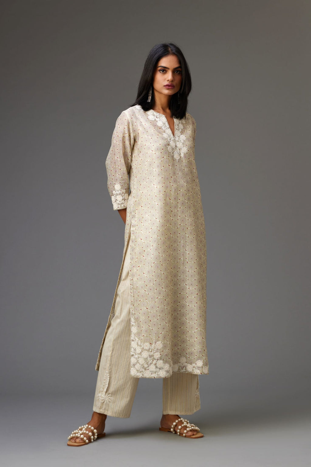 Yellow and grey Silk Chanderi hand-block printed kurta set with appliqué embroidery, highlighted with lace and sequins