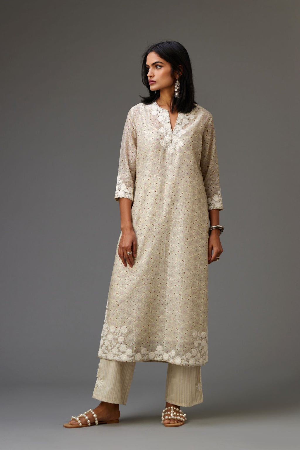 Yellow and grey Silk Chanderi hand-block printed kurta set with appliqué embroidery, highlighted with lace and sequins