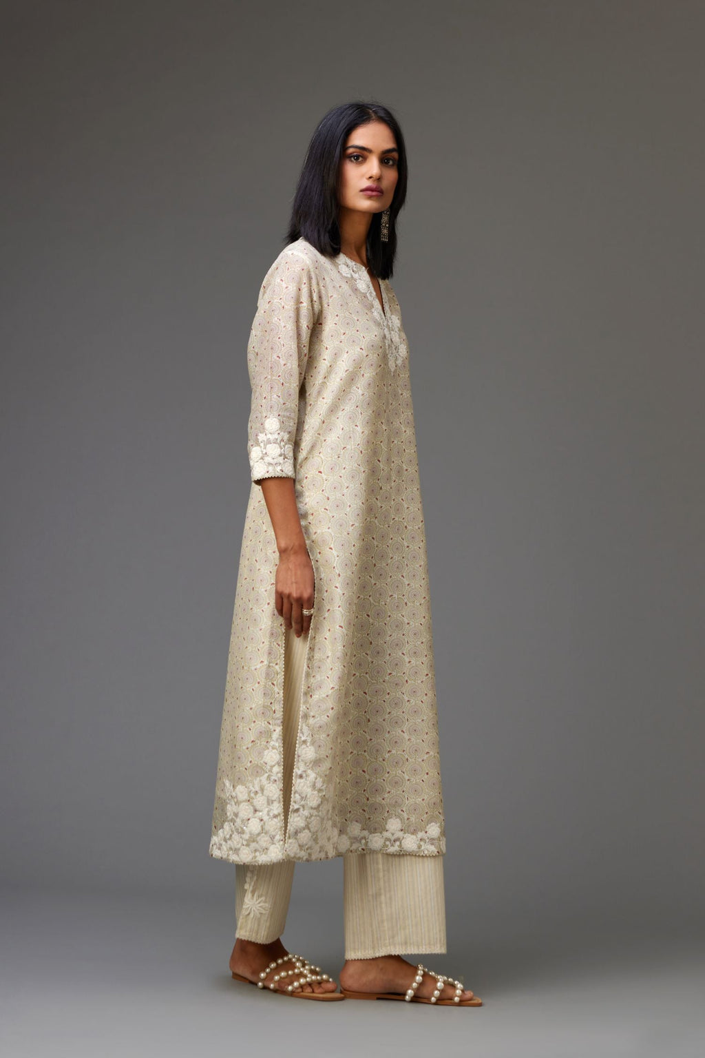 Yellow and grey Silk Chanderi hand-block printed kurta set with appliqué embroidery, highlighted with lace and sequins