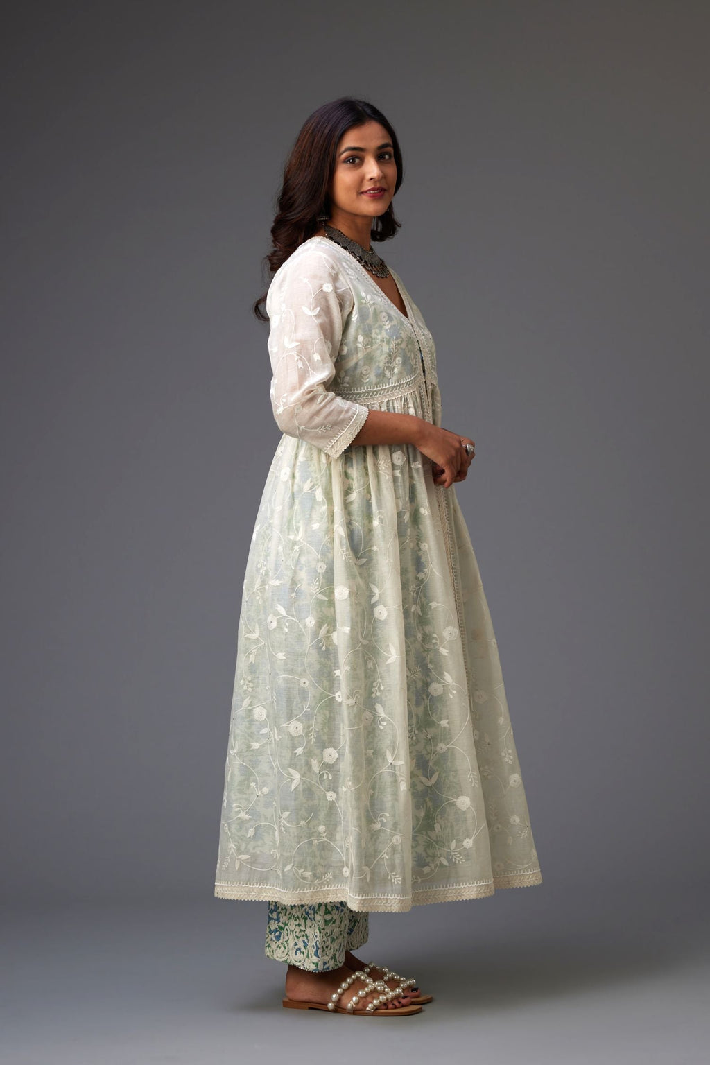 Off-white cotton chanderi front open kurta with all over tonal jaal embroidery, highlighted with sequins, beaded work and ric-rac.