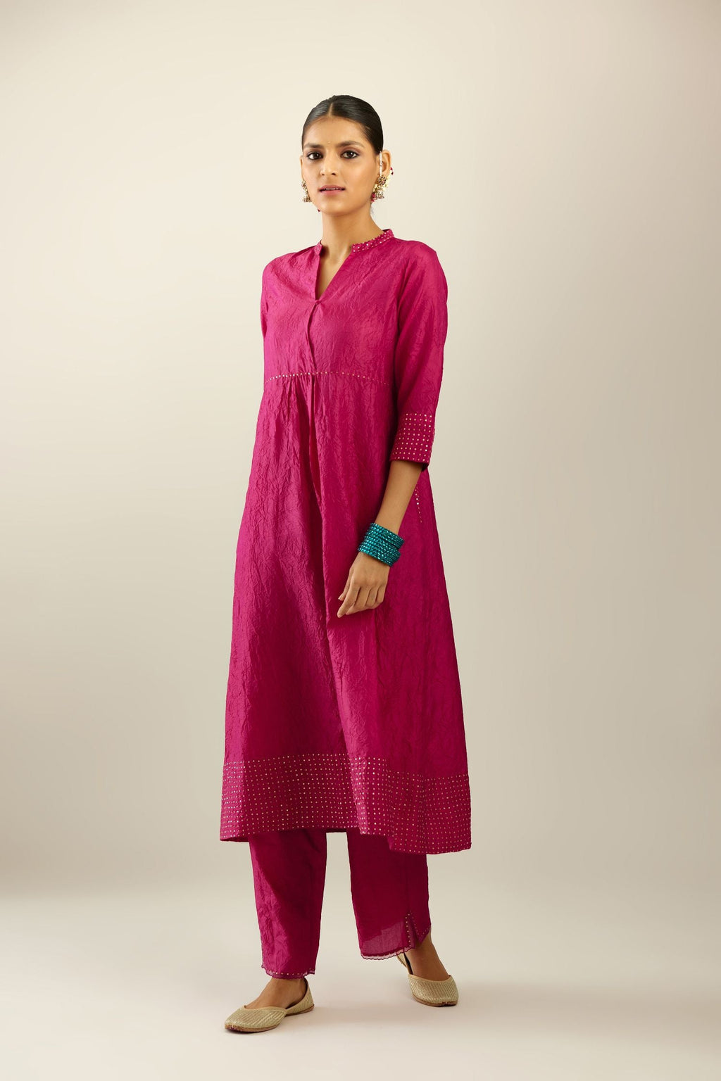 Jazzberry jam silk hand crushed kurta, highlighted with sequins.