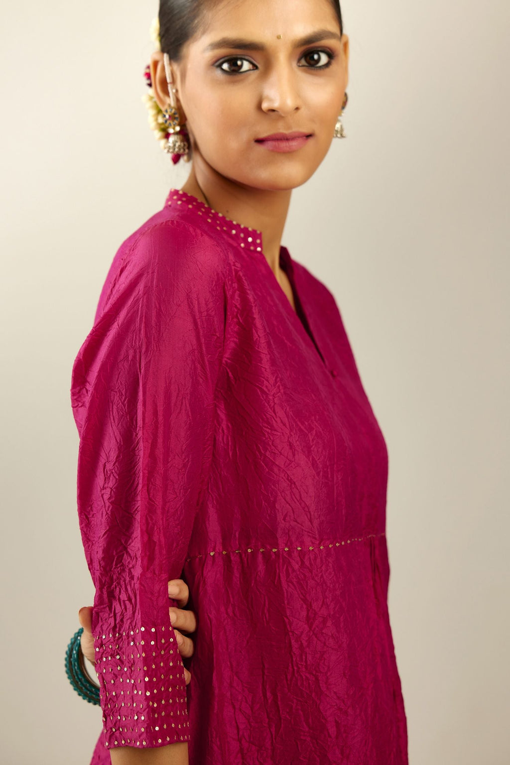 Jazzberry jam silk hand crushed kurta, highlighted with sequins.