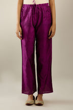 Sangria hand crushed pure silk straight pants with gold sequins work at hem and side pockets.
