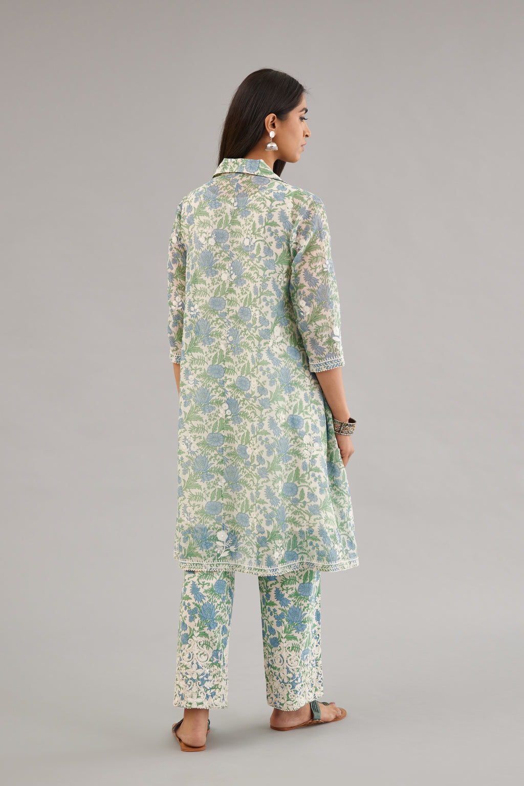 Blue & green hand block printed short kurta, paired with blue & green hand block printed cotton pants with dori embroidery at hem detailed with sequins work