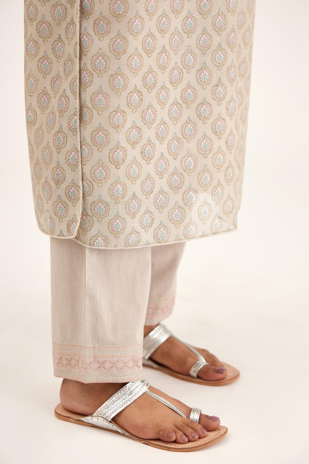 Grey silk chanderi straight kurta set with all-over hand block print and silver bugle beads detailing.