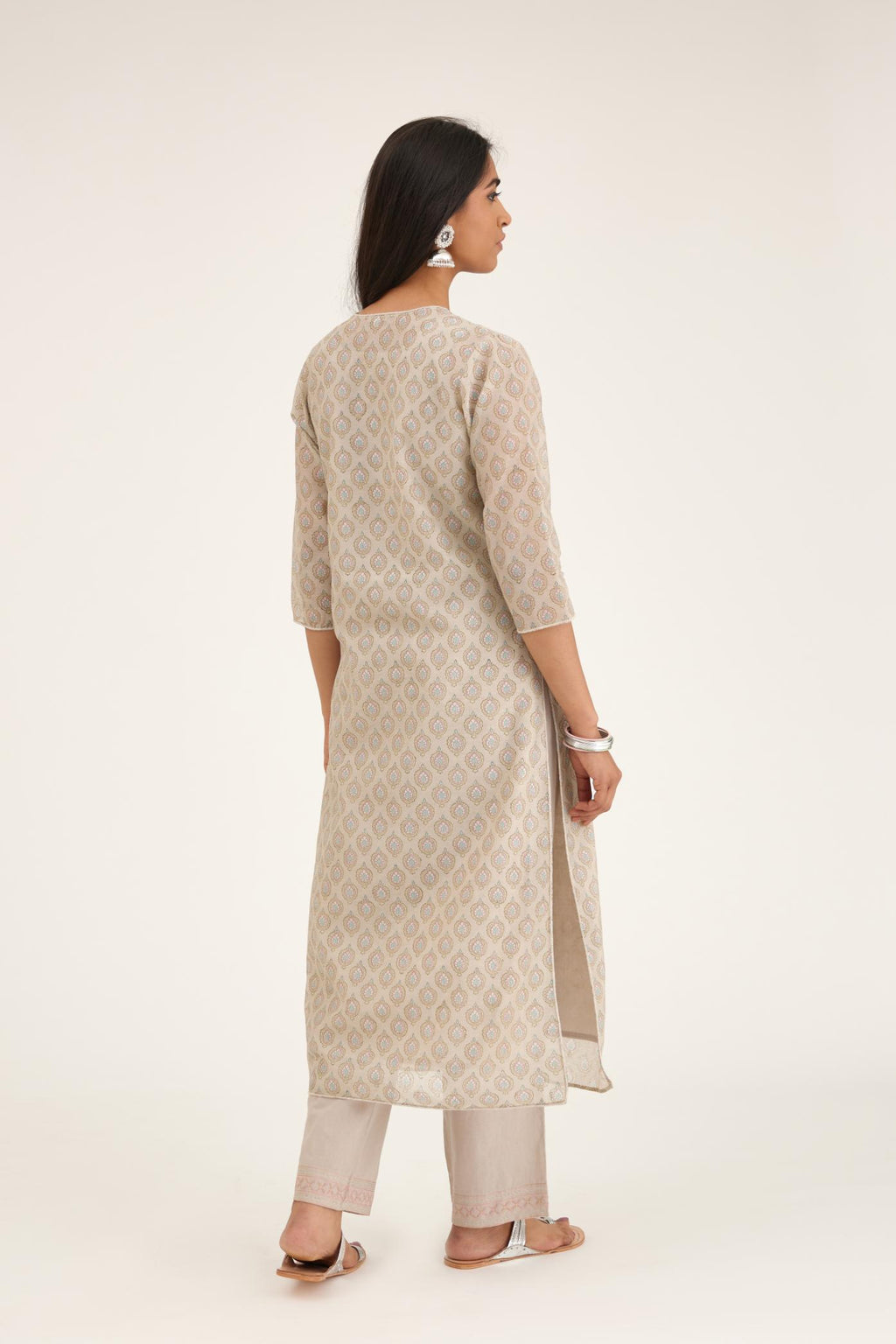 Grey silk chanderi straight kurta set with all-over hand block print and silver bugle beads detailing.