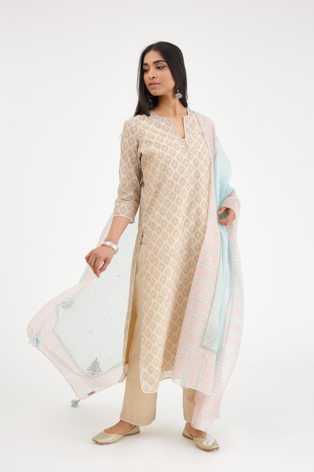 Beige silk chanderi straight kurta set with all-over hand block print and silver bugle beads detailing.
