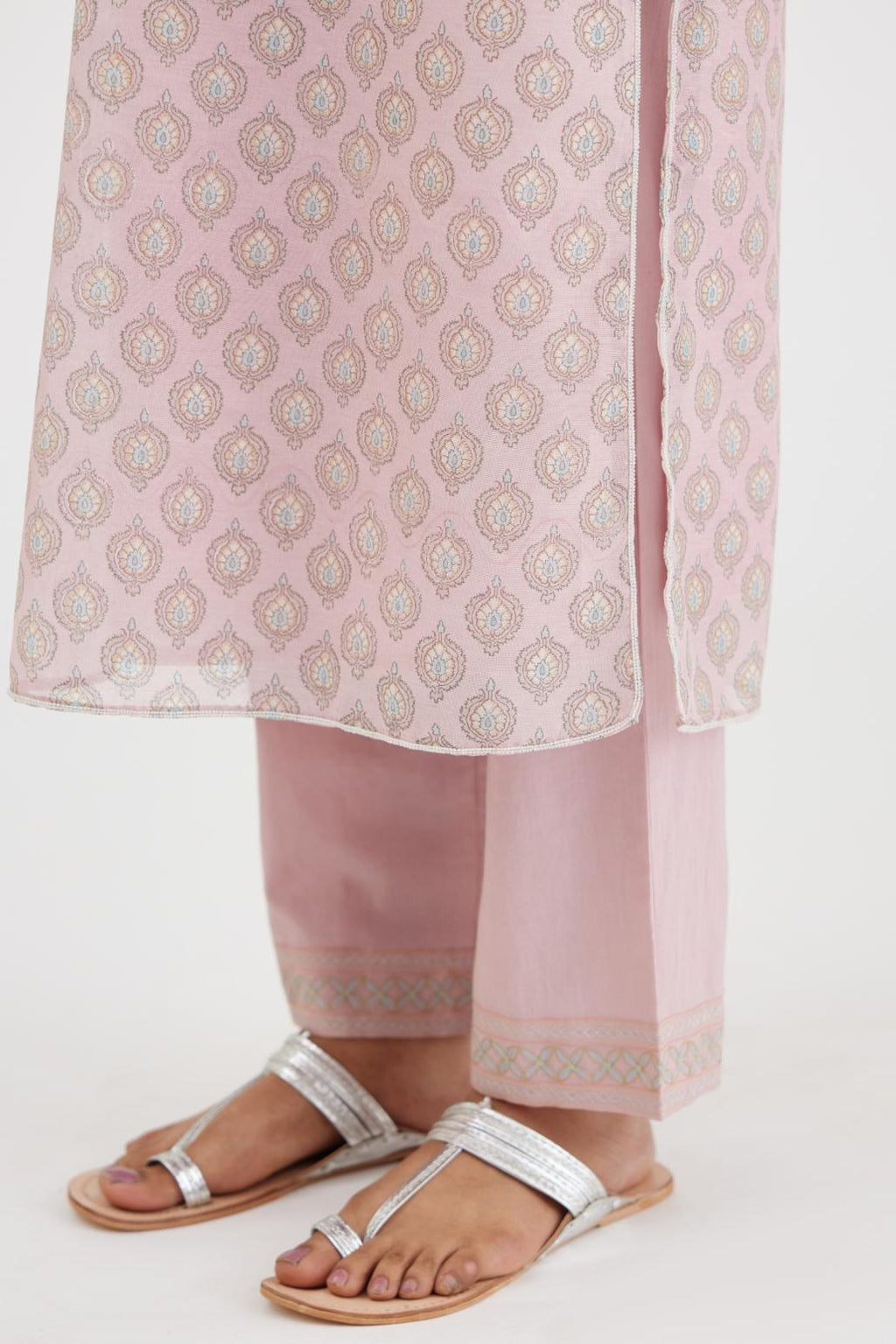 Pink silk chanderi straight kurta set with all-over hand block print and silver bugle beads detailing.