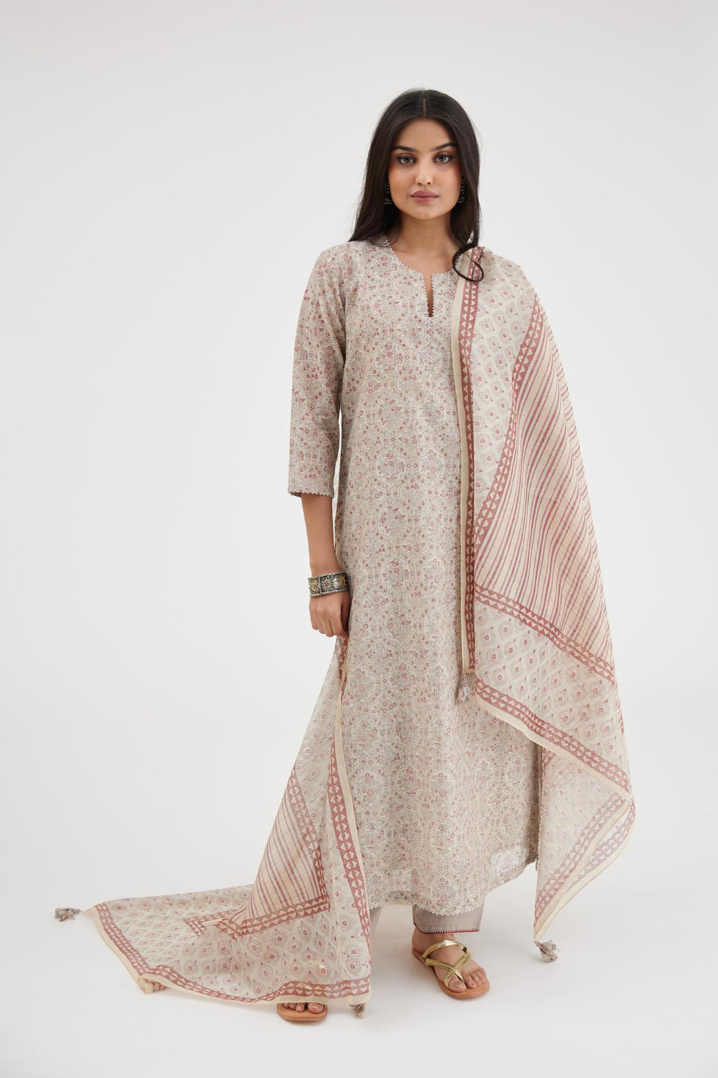 Grey hand block printed silk chanderi straight kurta set, highlighted with beads at edges.