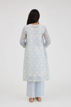 Blue and off white cotton chanderi Ikat design hand-block printed A-line short kurta set with V-neck and asymmetric hem.