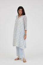 Blue and off white cotton chanderi Ikat design hand-block printed A-line short kurta set with V-neck and asymmetric hem.