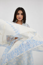 Blue and off white cotton chanderi Ikat design hand-block printed A-line short kurta set with V-neck and asymmetric hem.