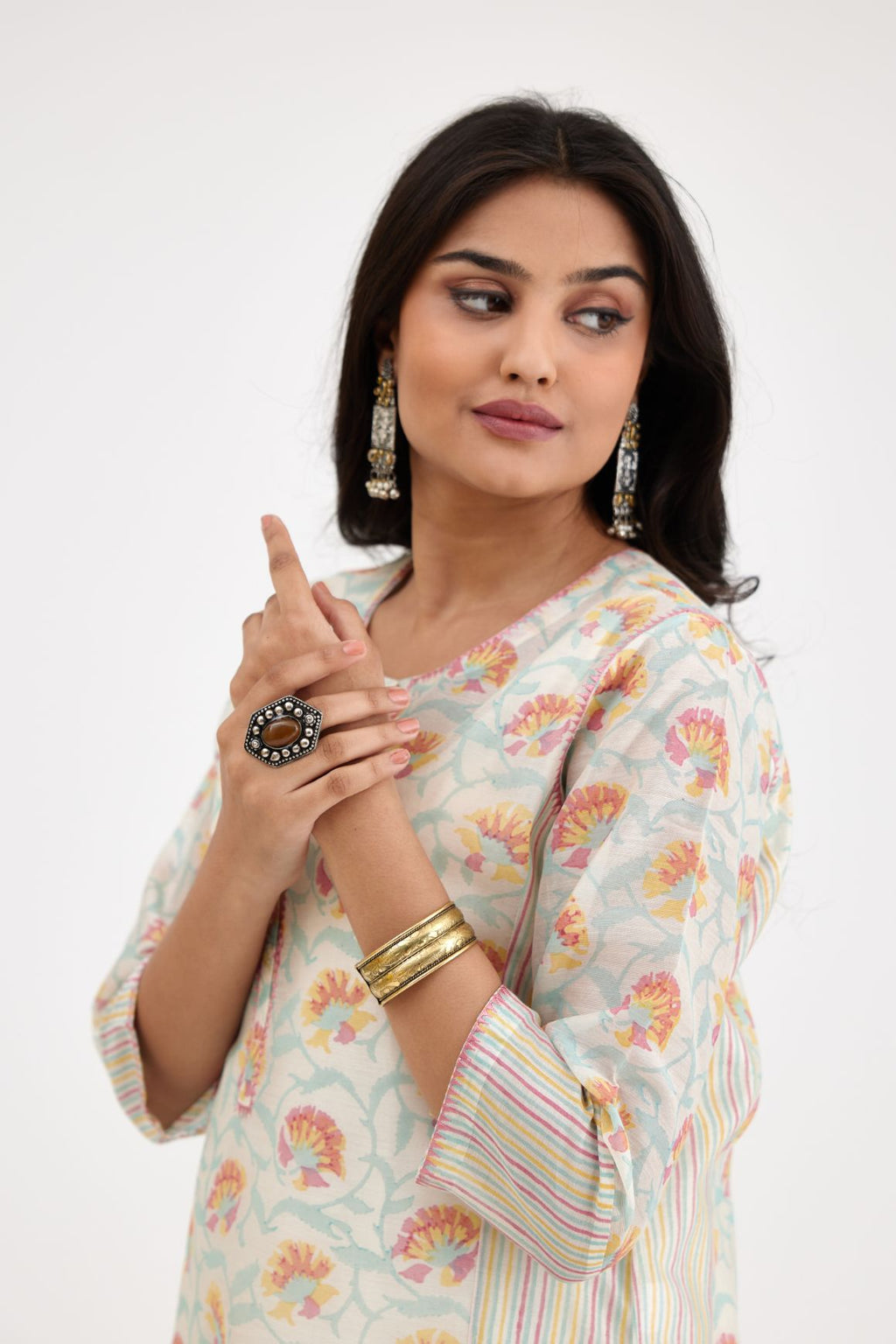 Pink and blue straight kurta with hand block print, front placket neckline & side slits.