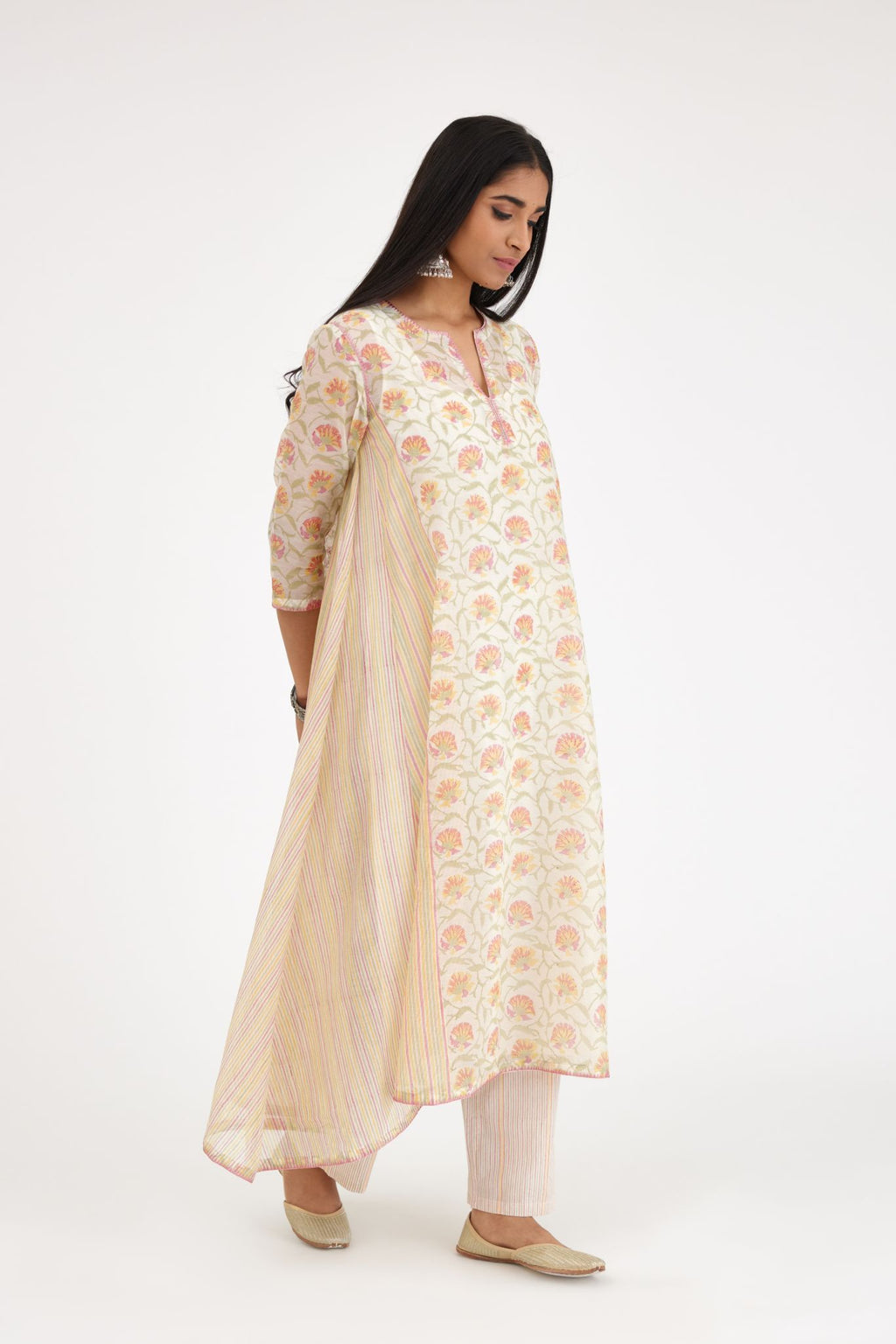 Pink and green hand block printed cotton chanderi kurta with asymmetric hem.