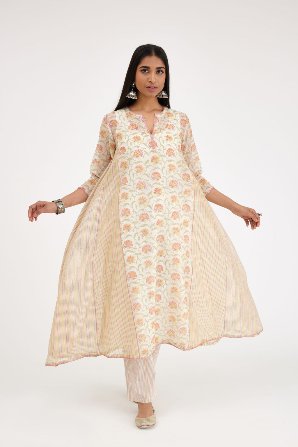 Pink and green hand block printed cotton chanderi kurta with asymmetric hem.