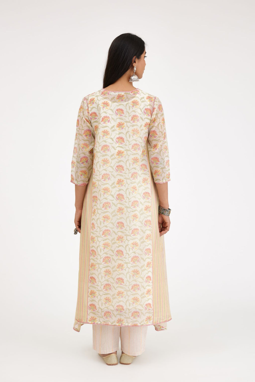 Pink and green hand block printed cotton chanderi kurta with asymmetric hem.