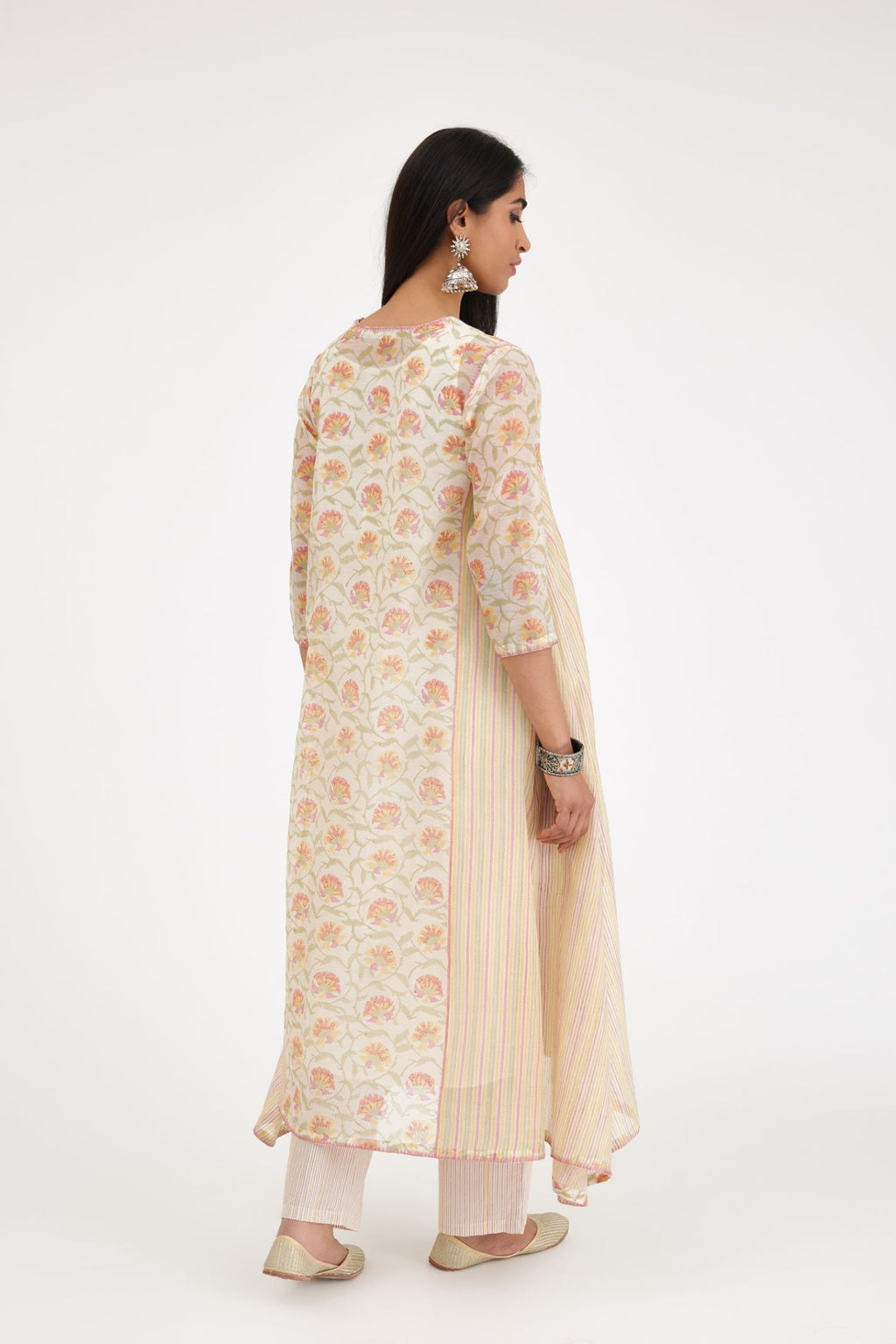 Pink and green hand block printed cotton chanderi kurta with asymmetric hem.