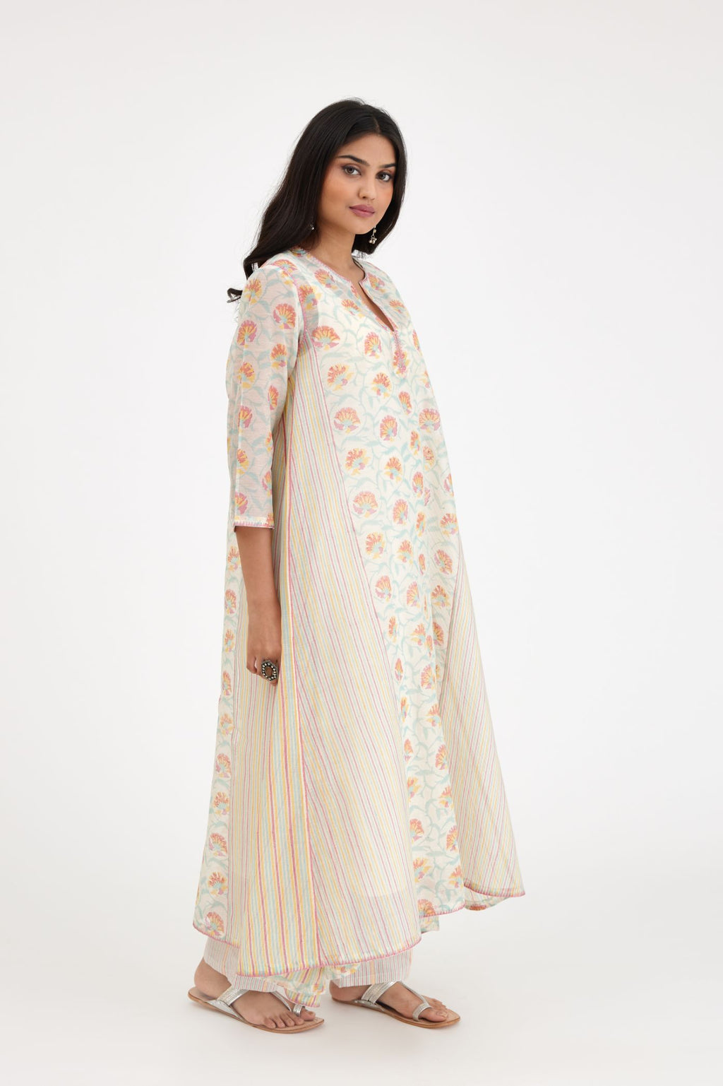 Pink and blue hand block printed cotton chanderi kurta set with asymmetric hem.