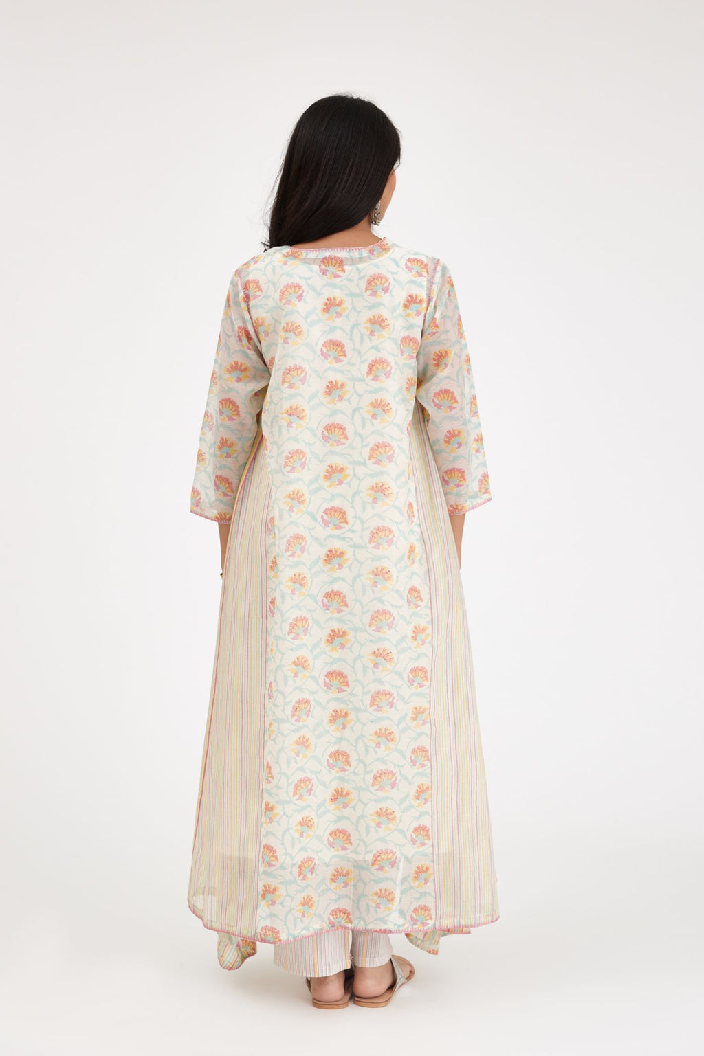 Pink and blue hand block printed cotton chanderi kurta set with asymmetric hem.