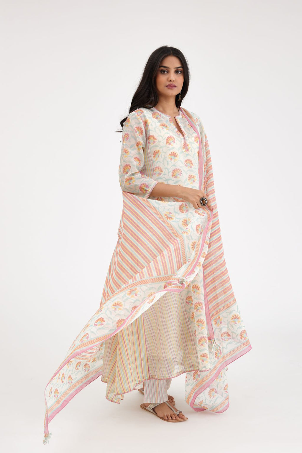 Pink and blue hand block printed cotton chanderi kurta set with asymmetric hem.