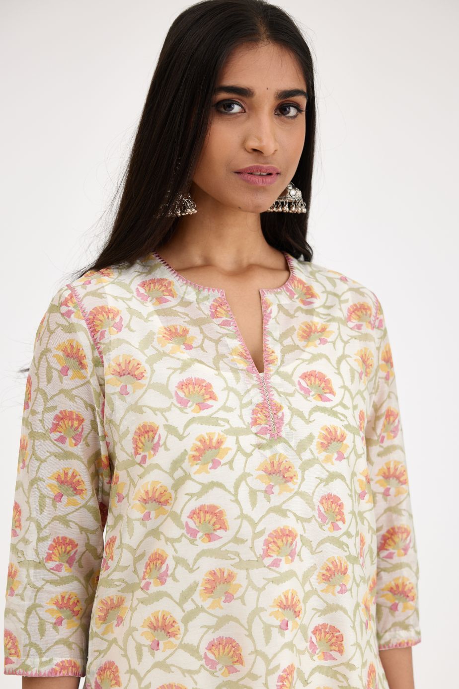 Pink and green straight kurta set with hand block print, with slit in front neckline.