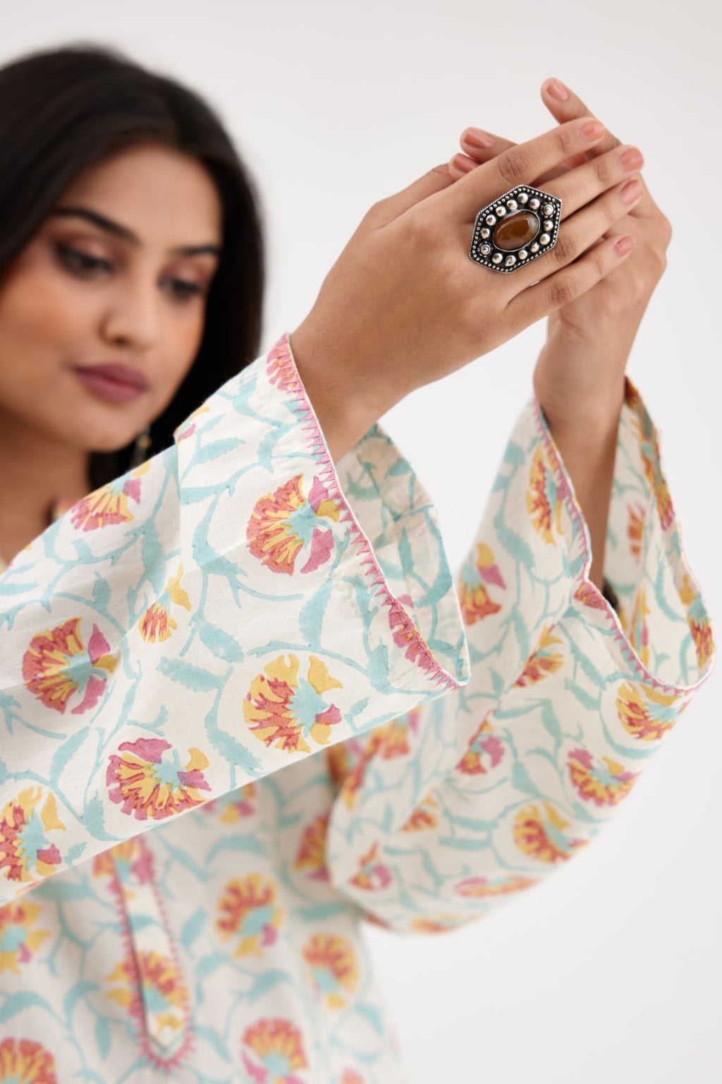 Pink and blue hand block printed cotton kurta set with and long sleeves.