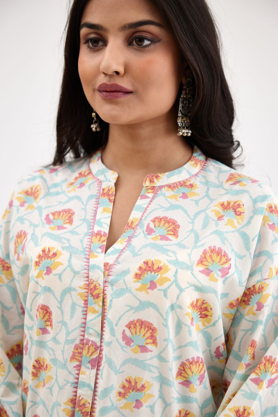 Pink and blue hand block printed cotton kurta set with and long sleeves.