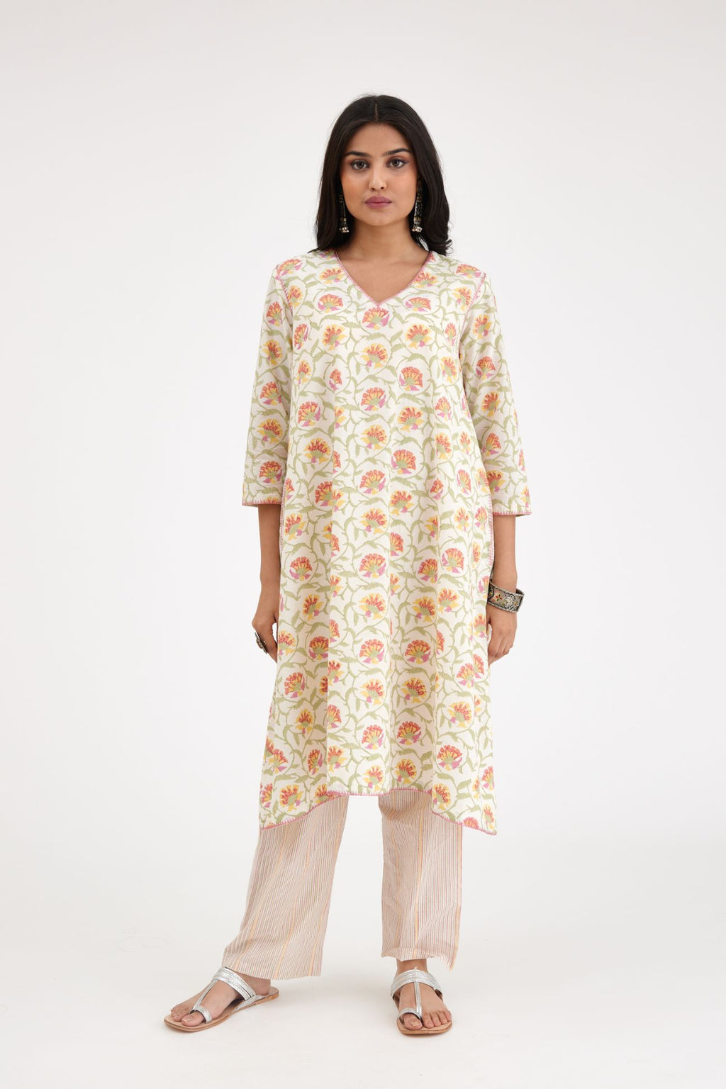 A-line hand block printed pink and green cotton kurta set.