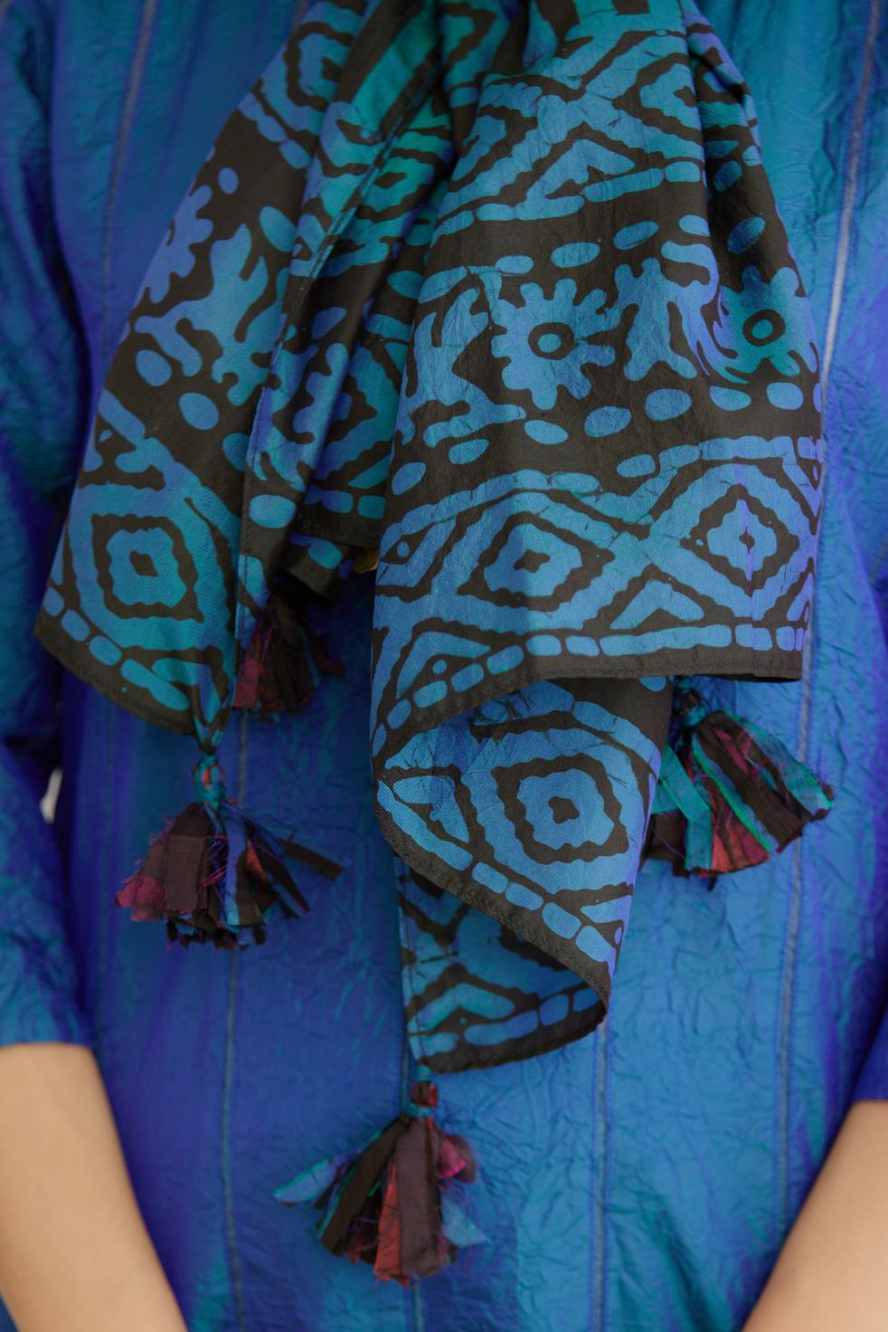 Blue and black batik printed stole with silk fabric tassels at all corners