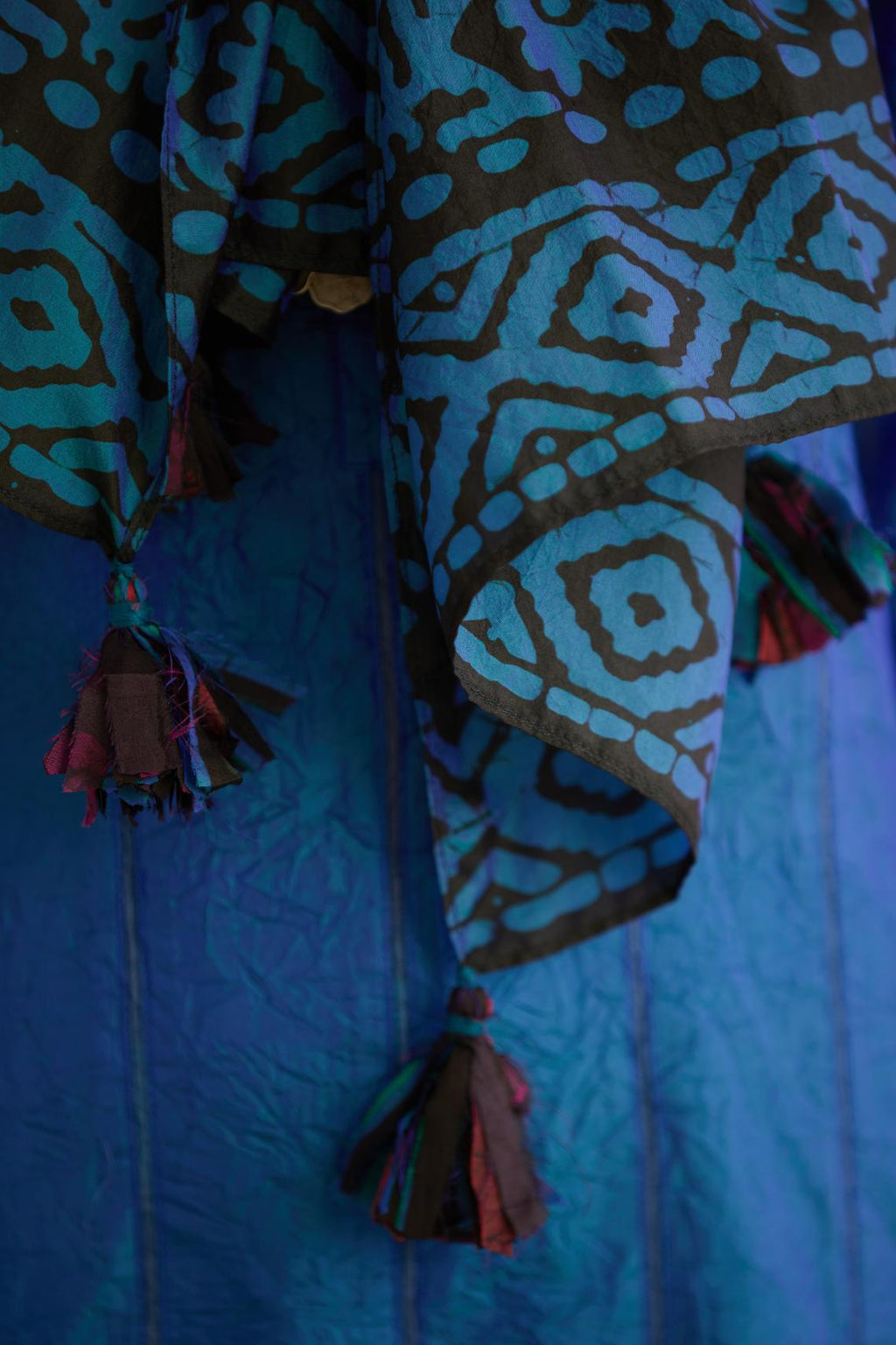 Blue and black batik printed stole with silk fabric tassels at all corners