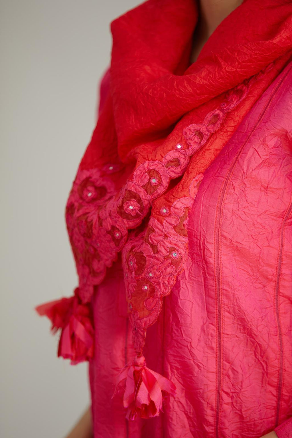 Red hand crushed silk square scarf with silk and organza cutwork embroidery and hand attached mirrors.