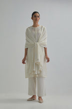 Off white straight short kurta set with all-over appliqué motifs, highlighted with sequins and beads.