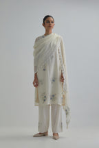 Off white straight short kurta set with all-over blue & beige hand block printed appliqué motifs, highlighted with sequins and multi coloured beads.